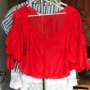 Flirty red silk Armani blouse with flounce sleeve